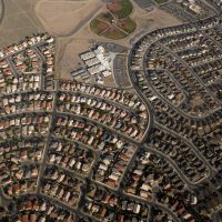 Rows of house line up on the east side of Albuquerque. The city has taken significant steps to control urban sprawl and limit the forming of geopolitical boundaries that many large cities suffer from. .